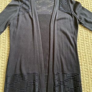 Navy cardigan sweater.